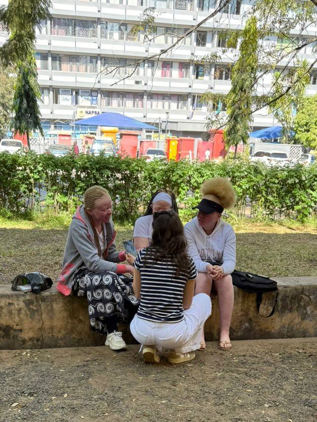 Carolina Khaskelis documenting stories with the albinism community in Zambia