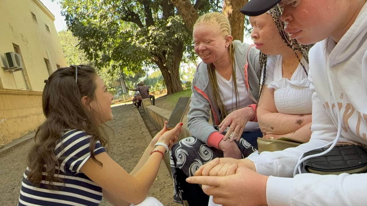 Carolina Khaskelis conducting an interview with a member of the albinism community in Zambia